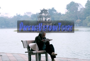 Reading by the Hoan Kiem Lake