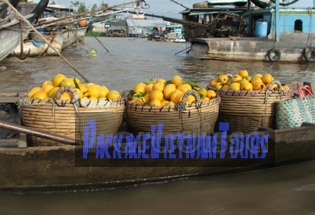 Orange boat - floating market Cai Be - Vinh Long