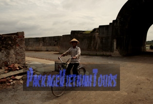 Boy enjoying fun cycling around the Ho Citadel in Thanh Hoa Province