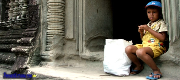 Boy at a temple of Angkor