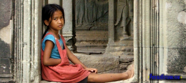 Little girl at a temple of Angkor